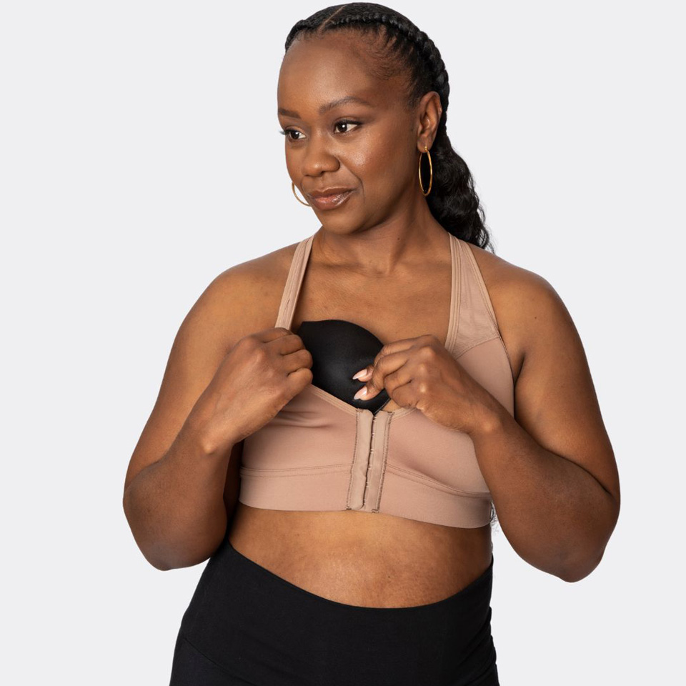 A woman modeling an AnaOno bra.