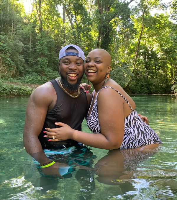 Jonise and her husband enjoy a lake.